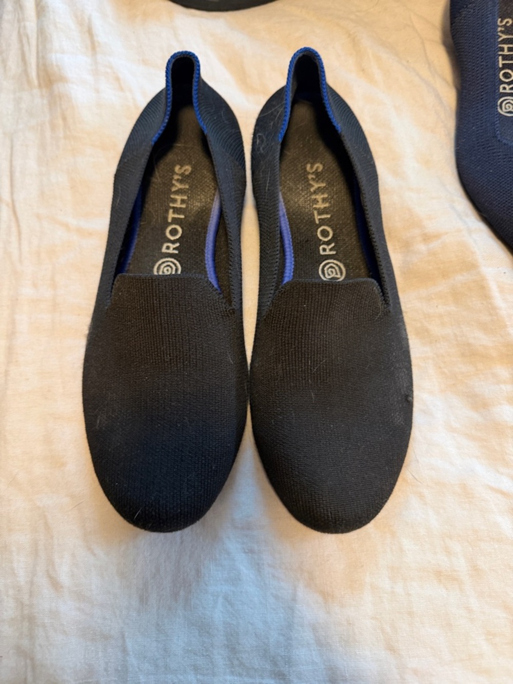 Rothy's Black Flats with Blue Trim